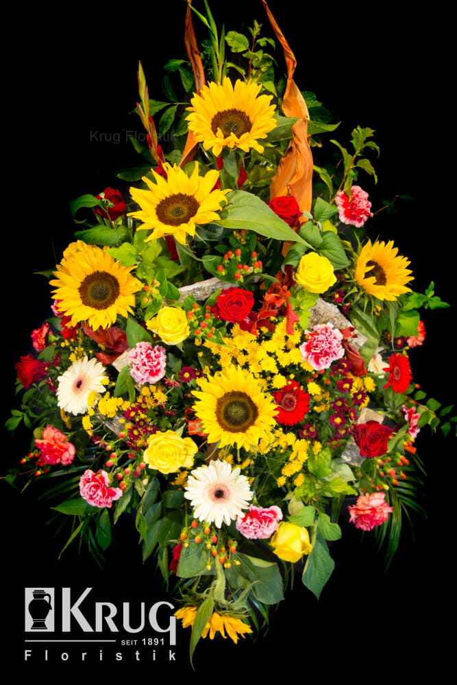 Trauergesteck gelb-rot mit Sonnenblumen, Rosen und Gerbera