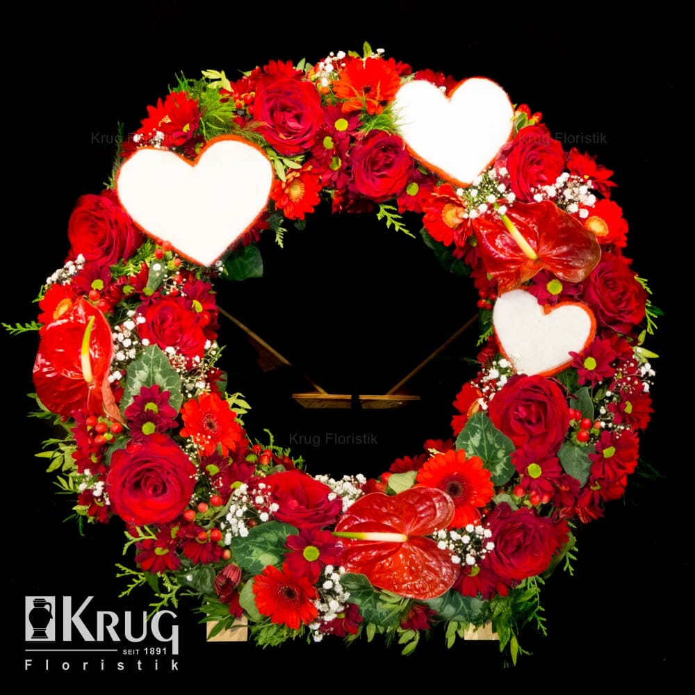 Trauerkranz rot-weiß mit Rosen, Anthurien, Gerbera, Schleierkraut